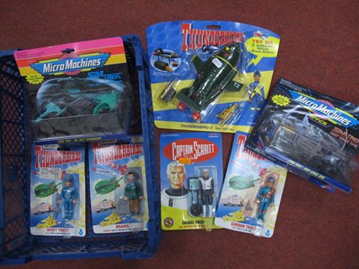 Lot 348 - Four Carded Plastic Action Figures, comprising...