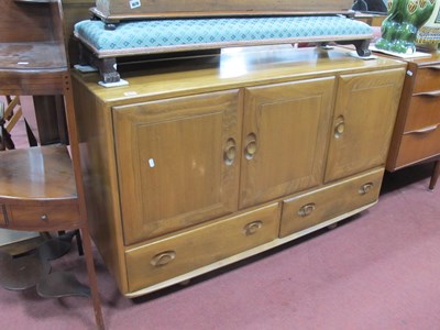 Lot 1671 - Ercol Three Door Sdeboard, over two drawers...