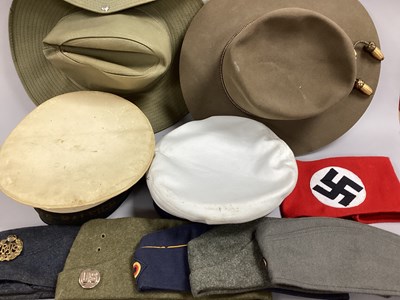 Lot 726 - Military headgear of various types/branches of...