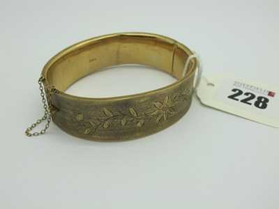 Lot 228 - A 9ct Gold Wide Bangle, with a brushed finish...